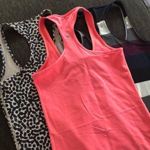Three lulu lemon cool racer back tanks - size 4